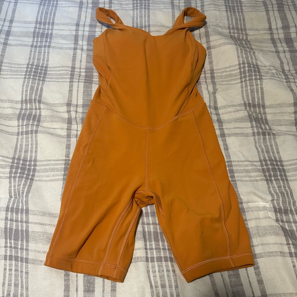 Lululemon Body suit, 5” shorts.